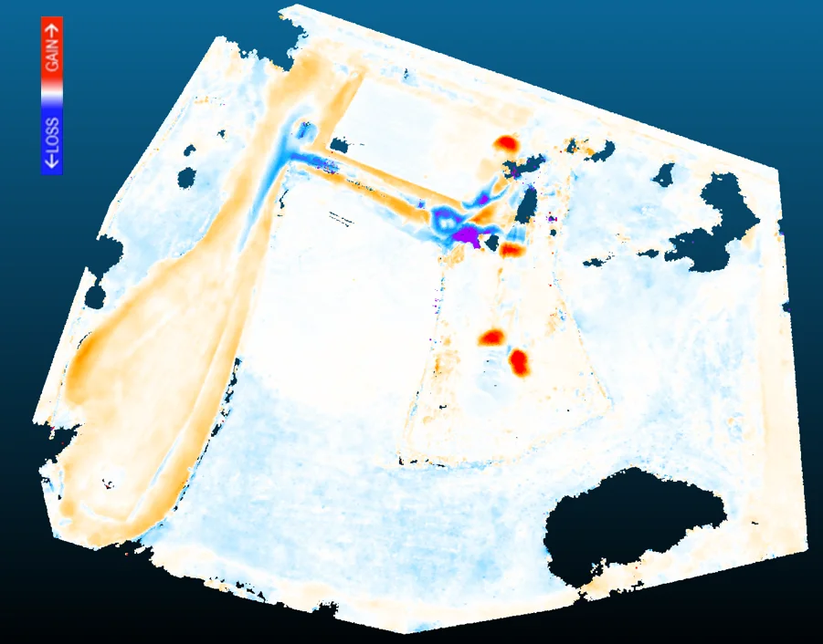 Change-magnitude map between two site visits showing areas of material gain and loss