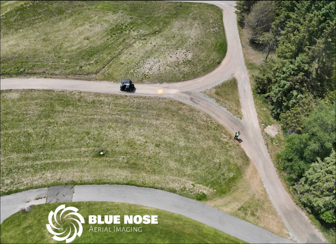 Overhead drone view of a launch site and ground crew during a Blue Nose Aerial Imaging mapping flight